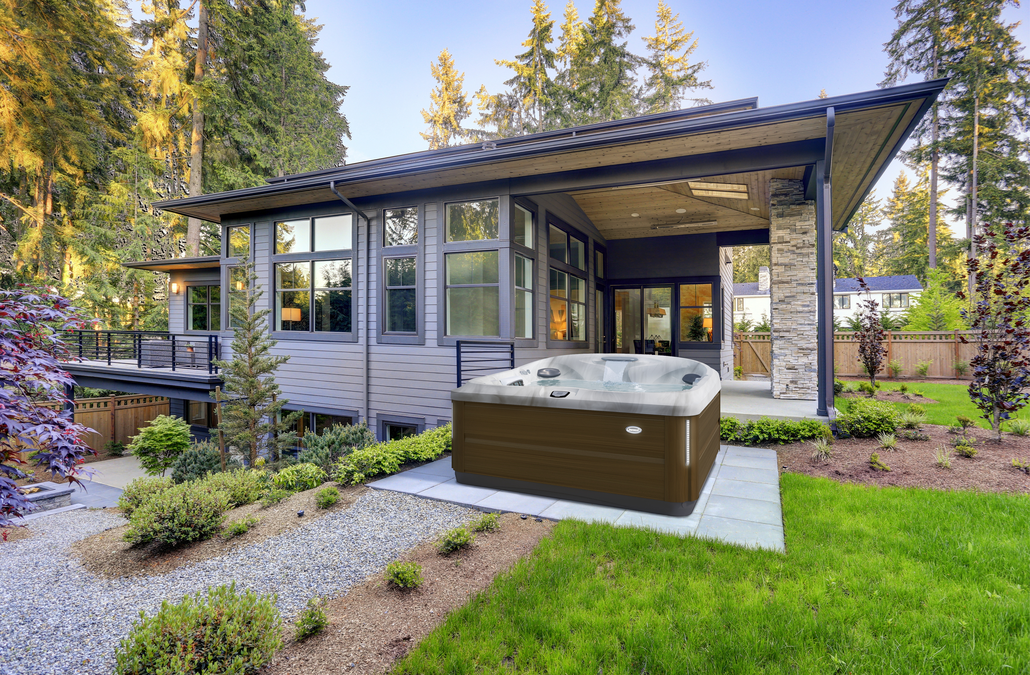 Modern installation of the J-485 Jacuzzi Hot Tub in a backyard.