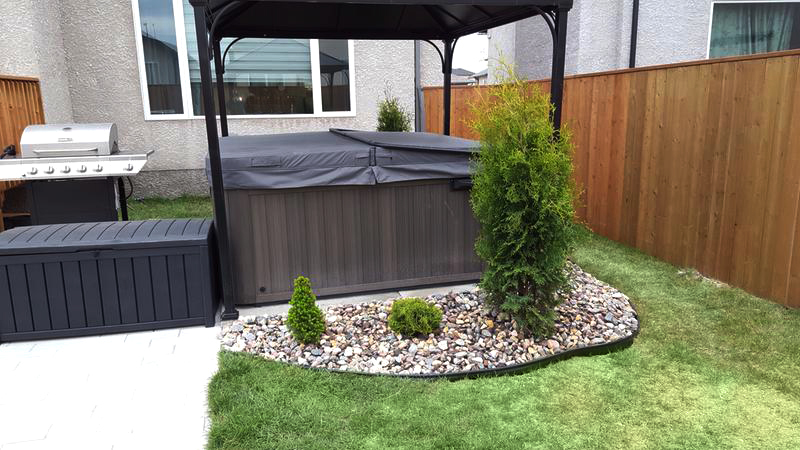 Backyard hot tub installation. Backyard hot tub installation.