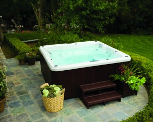 Backyard hot tub installation.