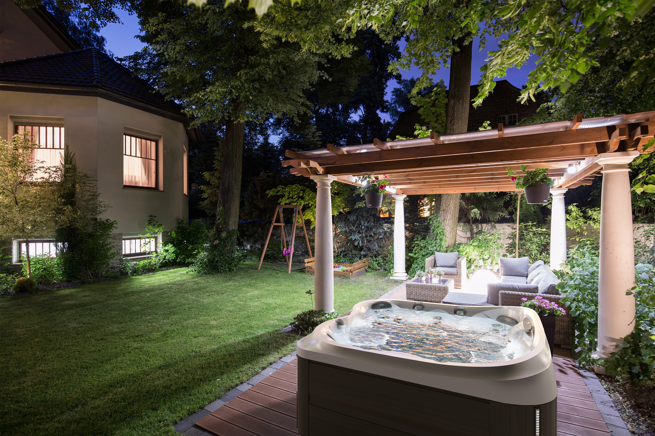 Outdoor hot tub installation at night.